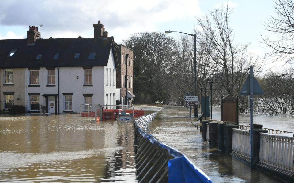 The temporary flood defences in Bewdley, Worcestershire. Bewdley, which has been washed out for three years running, is set to see £6.2 million spent on a permanent flood defence - Joe Giddens 