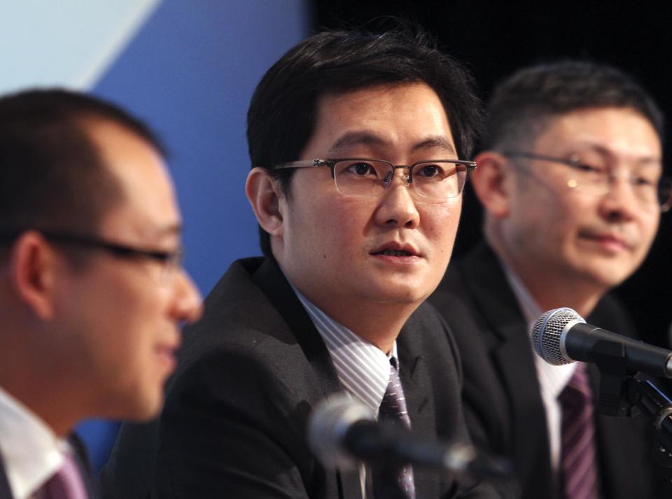 Tencent President Lau, Chairman Ma and CFO Lo attend news conference in Hong Kong