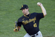 Pittsburgh Pirates pitcher Derek Holland throws against the Minnesota Twins in the first inning of a baseball game Monday, Aug. 3, 2020, in Minneapolis. (AP Photo/Jim Mone)