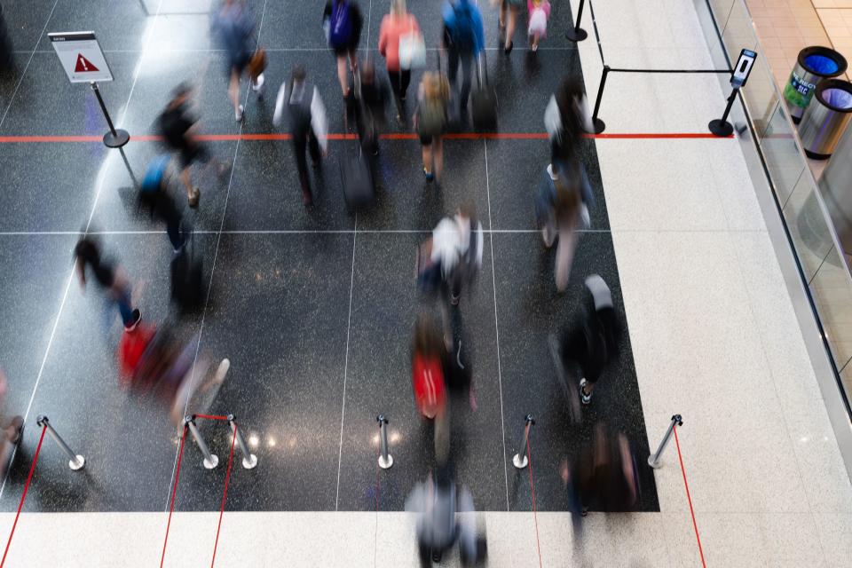 Travelers arrive at the Salt Lake City International Airport in Salt Lake City on Friday, May 19, 2023. | Ryan Sun, Deseret News