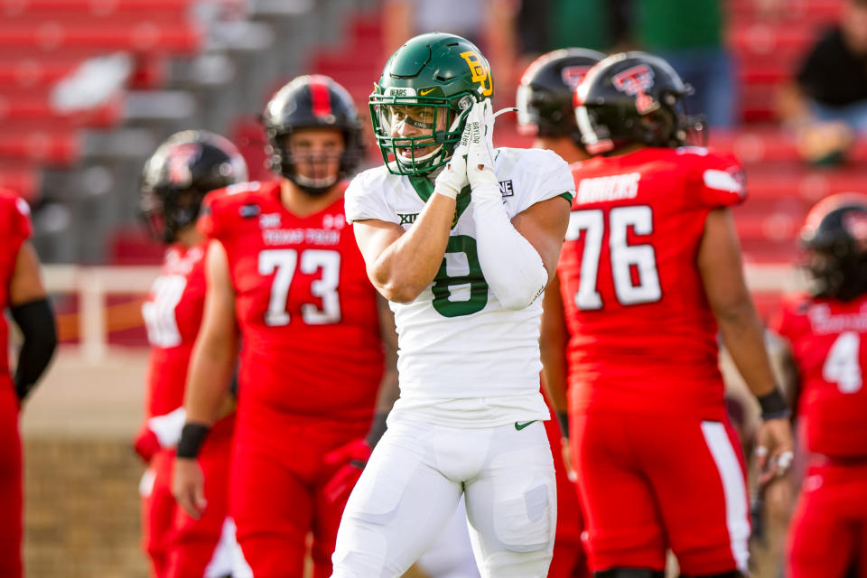 LUBBOCK, TEXAS - NOVEMBER 14: Linebacker Jalen Pitre #8 of the Baylor Bears signals for a safety during the first half of the college football game against the Texas Tech Red Raiders at Jones AT&T Stadium on November 14, 2020 in Lubbock, Texas. (Photo by John E. Moore III/Getty Images)