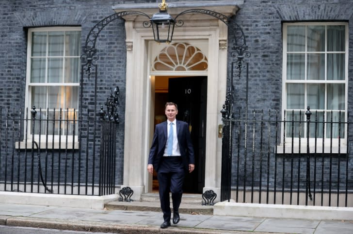 英國新任財長杭特趁特拉斯勢弱擴權，被稱為「地下首相」。   圖 : 翻攝自新華網