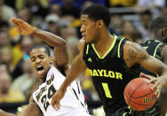 KANSAS CITY, MO - MARCH 10: Perry Jones III #1 of the Baylor Bears drives against Kim English #24 of the Missouri Tigers in the first half during the championship game of the 2012 Big 12 Men's Basketball Tournament at Sprint Center on March 10, 2012 in Kansas City, Missouri. (Photo by Jamie Squire/Getty Images)