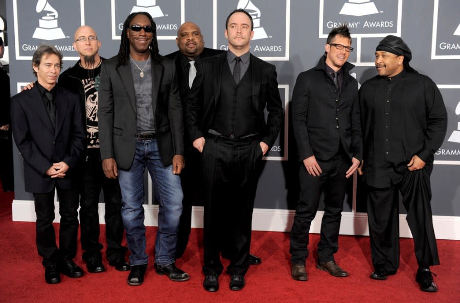 FILE – Members of the Dave Matthews Band, Tim Reynolds, Jeff Coffin, Boyd Tinsley, Rashawn Ross, Dave Matthews, Stefan Lessard and Carter Beauford arrive at the Grammy Awards in Los Angeles on Jan. 31, 2010. The band are among the 2024 nominees for induction into the Rock & Roll Hall of Fame. (AP Photo/Chris Pizzello, File)