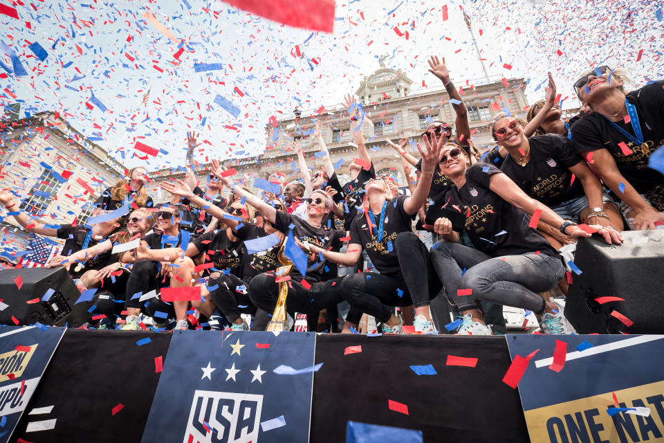 Rapinoe, center, celebrates the 2019 World Cup at a New York City parade<span class="copyright">Ira L. Black—Corbis/Getty Images</span>