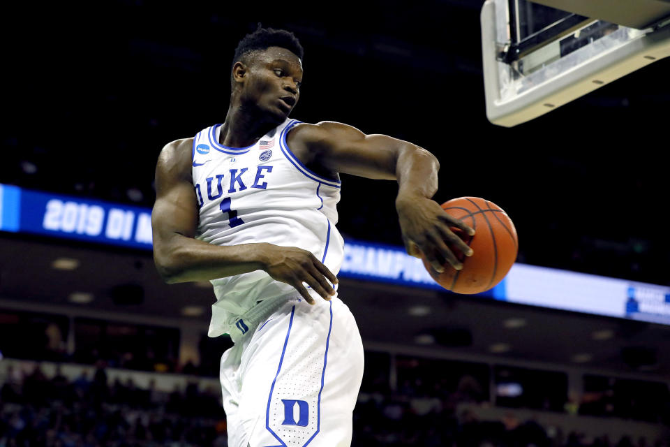 <p>Zion Williamson #1 of the Duke Blue Devils saves the ball from going out of bounds against the North Dakota State Bison in the first half during the first round of the 2019 NCAA Men’s Basketball Tournament at Colonial Life Arena on March 22, 2019 in Columbia, South Carolina. </p>