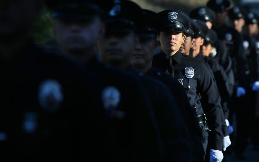 LOS ANGELES, CA - May 24 2010: Members of the 5-10 Los Angeles Police Department recruit class line up for graduation at the LAPD training academy in Elysian Park November 5 2010 in Los Angeles. The class began in May with 46 recruits, but at the end of their training, only 30 would graduate. (Brian van der Brug / Los Angeles Times)