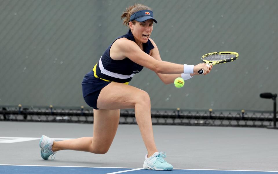 Johanna Konta of Great Britain attempts a volley during her match against Marie Bouzkova - Getty Images