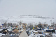 The Oceti Sakowin camp is seen in a snow storm during a protest against plans to pass the Dakota Access pipeline near the Standing Rock Indian Reservation, near Cannon Ball, North Dakota, U.S. November 29, 2016. REUTERS/Stephanie Keith