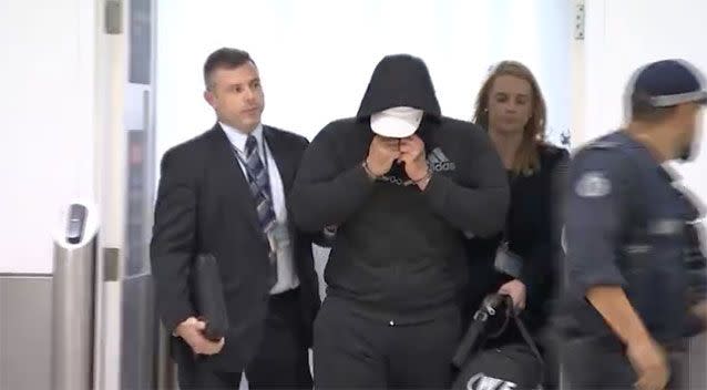 Mahmoud Ahmad was arrested after arriving at Sydney Airport. He has since been charged. Picture: NSW Police