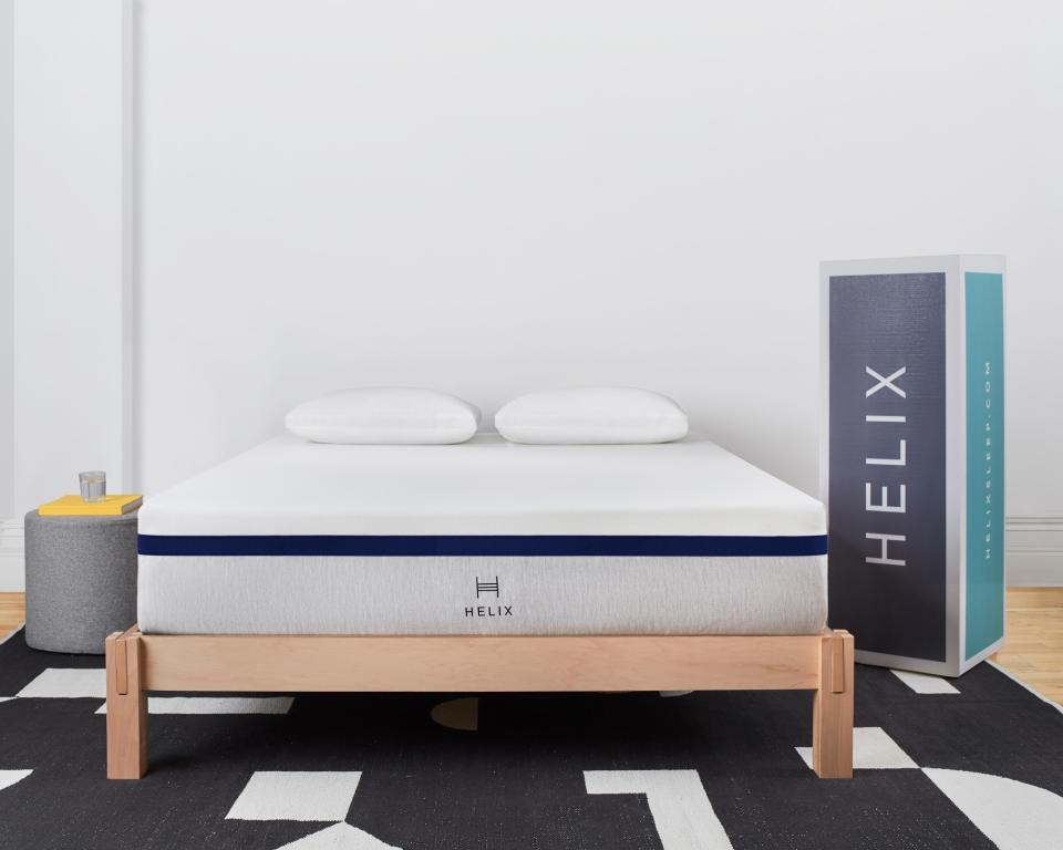 Helix mattress on wooden bed frame