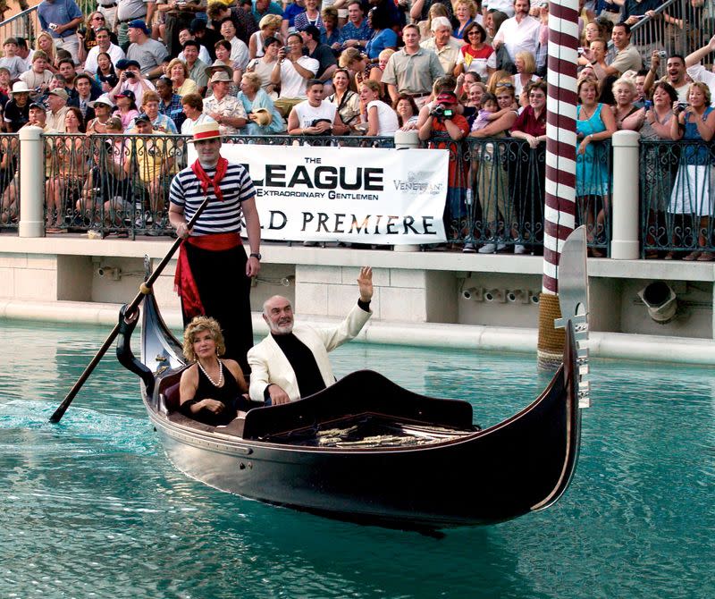 FILE PHOTO: Actor Sean Connery and his wife Micheline arrive by gondola at the Venetian Resort Hotel & Casino in Las Vegas