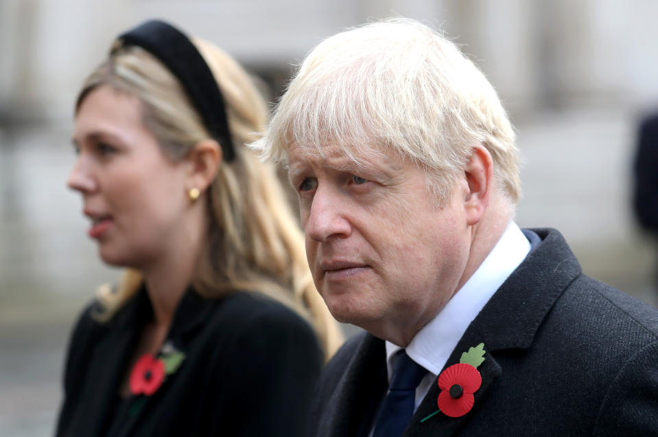 Britain's prime minister Boris Johnson with partner Carrie Symonds at the National Service of Remembrance at the Cenotaph on Sunday. Photo: Chris Jackson/WPA Pool/Getty Images