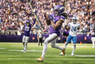 Minnesota Vikings wide receiver K.J. Osborn, foreground, catches the winning touchdown late in the fourth quarter of an NFL game against the Detroit Lions, Sunday, Sept. 25, 2022, in Minneapolis. (Jerry Holt/Star Tribune via AP)