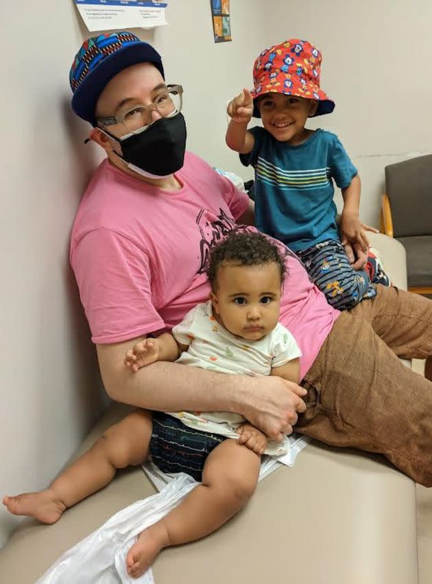 The author and his two kids at the doctor's office. (Photo: Courtesy of Jay Deitcher)