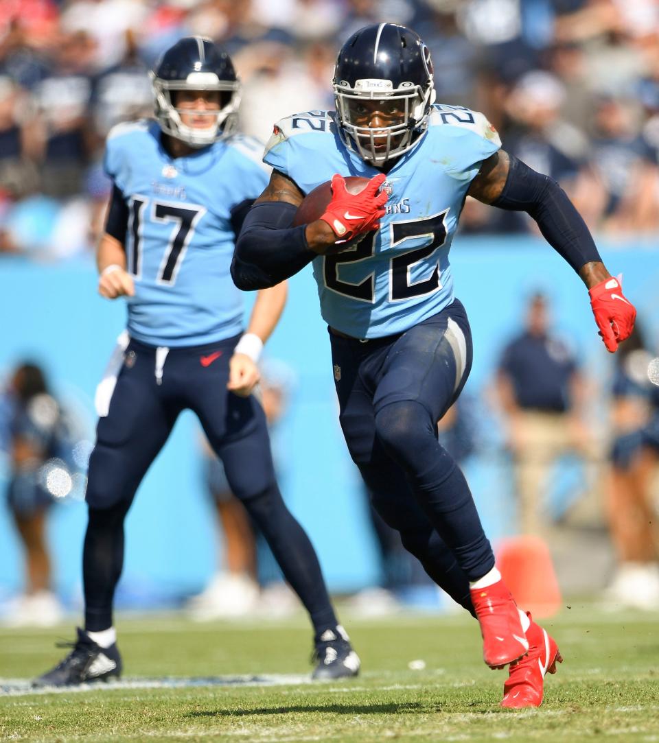 Tennessee Titans running back Derrick Henry (22) rushes for a gain of yards as they face the Chiefs at Nissan Stadium Sunday, Oct. 24, 2021 in Nashville, Tenn. 