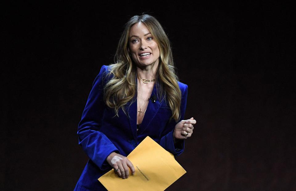 Olivia Wilde Goes Viral After She's Handed Mysterious 'Confidential' Envelope During CinemaCon