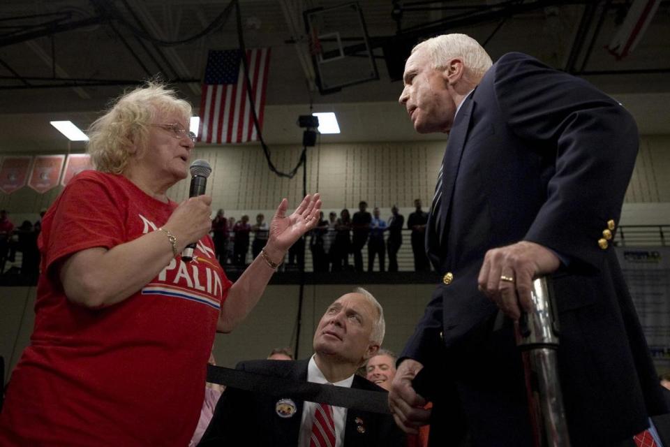 The moment John McCain defended his presidential campaign oponent Barack Obama after a woman referred to his as an Arab (AFP/Getty Images)