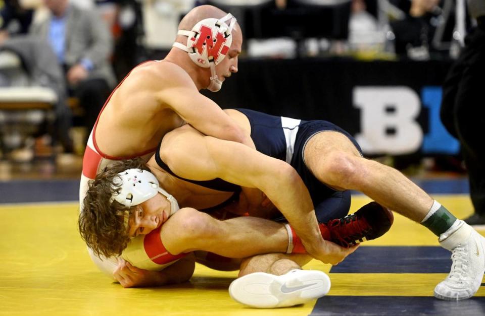 Penn State’s Levi Haines wrestles Nebraska’s Peyton Robb in the 157 lb championship bout of the Big Ten wrestling championships at the Crisler Center on Sunday, March 5, 2023. Haines won in sudden victory.