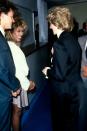 <p>Tina Turner wore a spandex dress and a white oversized jacket when she met Princess Diana backstage at the Prince's Trust concert in Wembley Stadium. </p>