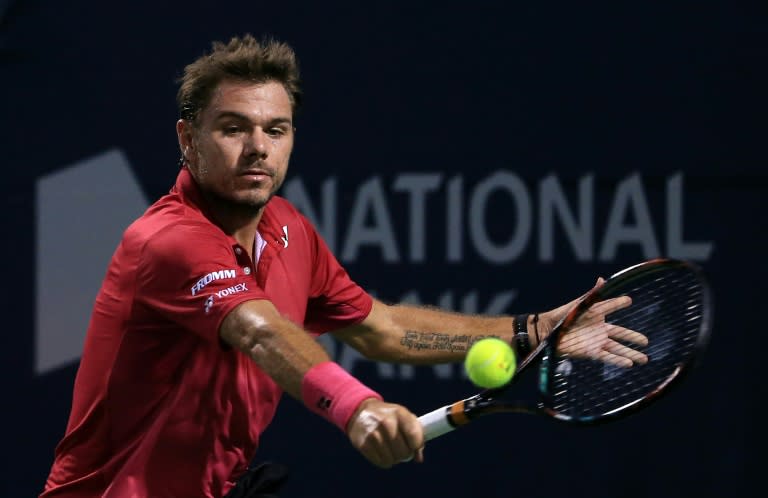 Stanislas Wawrinka defeated Mikhail Youzhny in two hours for a third-round berth at the Toronto Masters