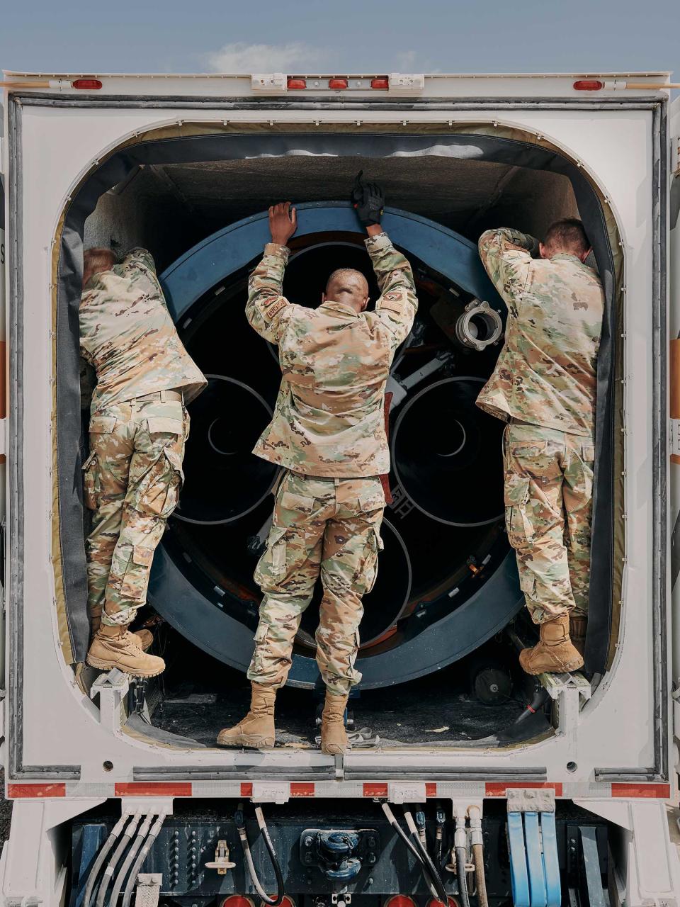 Preparing a Minuteman III to be lowered into the silo.<span class="copyright">Benjamin Rasmussen for TIME</span>