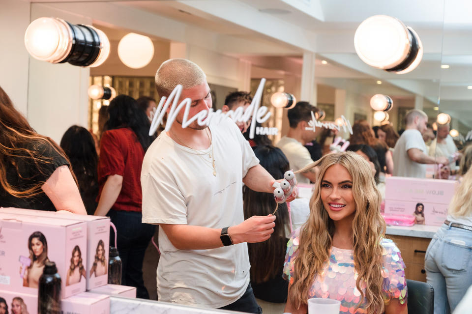 <p>Chrishell Stause indulges her mermaid-styling dreams during the Mermade Hair launch with hairstylist Ruslan Nureev at Mare Salon in West Hollywood.</p>