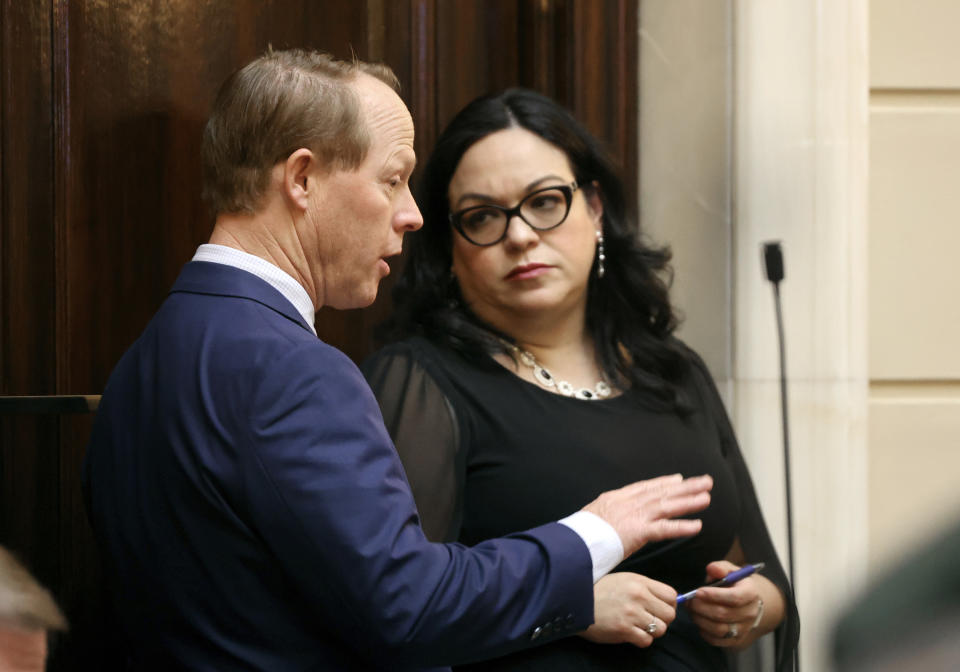 FILE - Sen. Keith Grover, R-Provo, talks to Senate Minority Leader Luz Escamilla, D-Salt Lake City, before the Senate voted to pass HB261, Equal Opportunity Initiatives, in the Senate chamber at the Capitol in Salt Lake City on Thursday, Jan. 25, 2024.e. (Kristin Murphy/The Deseret News via AP, File)