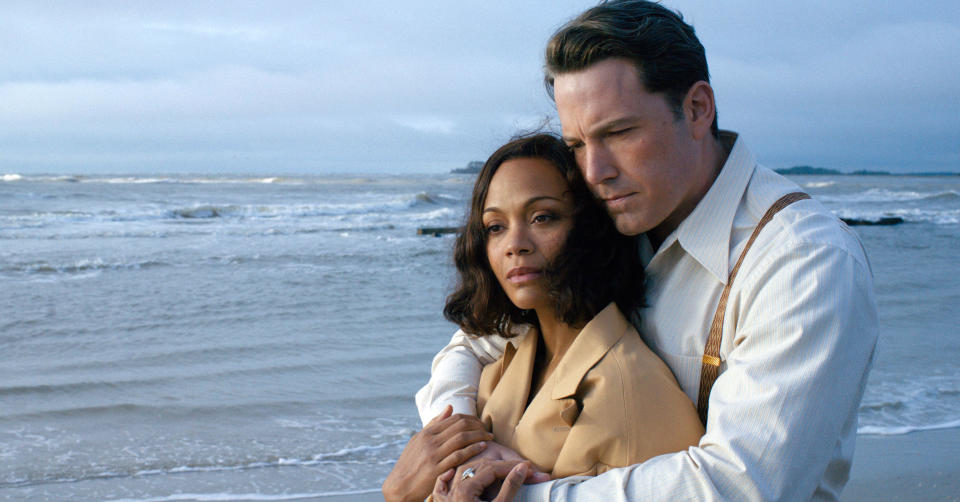 This image released by Warner Bros. Entertainment shows Zoe Saldana, left, and Ben Affleck in a scene from "Live By Night." (Claire Folger/Warner Bros. Entertainment via AP)