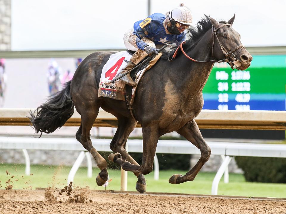 Zandon, with Flavien Prat up, wins the Blue Grass Stakes on Saturday, April 9, 2022, at Keeneland race course.