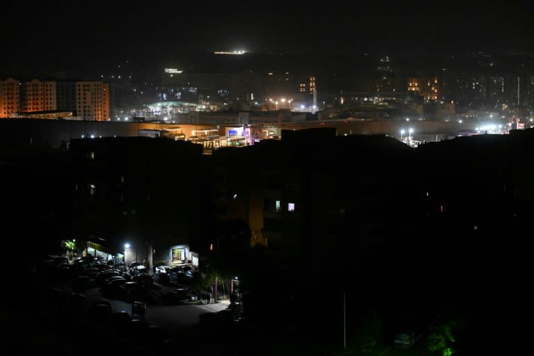 Egypt's capital Cairo has faced nearly a year of planned blackouts which are now extending into the evenings, amid soaring temperatures (Khaled DESOUKI)