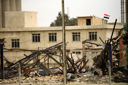 A destroyed train station from clashes is seen during a battle against Islamic State militants, in Mosul, Iraq March 19, 2017. REUTERS/Thaier Al-Sudani