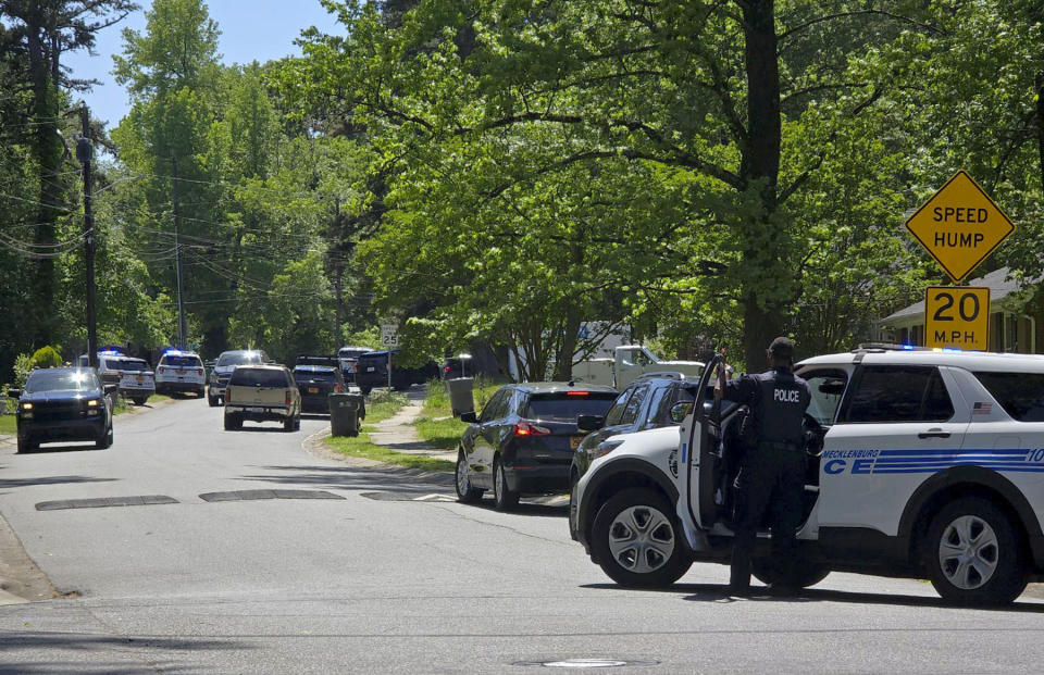 Multiple law enforcement officers were shot Monday, April 29, 2024, in east Charlotte, N.C., the Charlotte Mecklenburg Police Department said. Officers from the U.S. Marshals Task Force were conducting an investigation in a suburban neighborhood when they were fired upon, the CMPD said in a post on X, formerly Twitter. (Khadejeh Nikouyeh/The Charlotte Observer via AP)