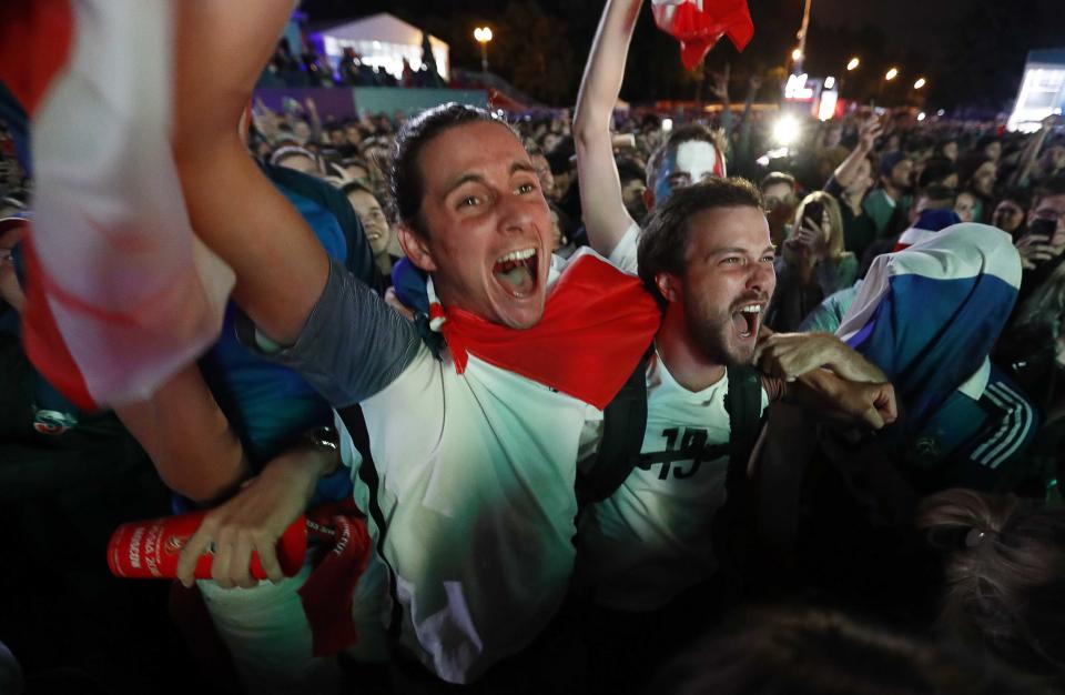 <p>Supporters of France celebrate the victory as they watch the match in a fan zone. REUTERS/Sergei Karpukhin </p>