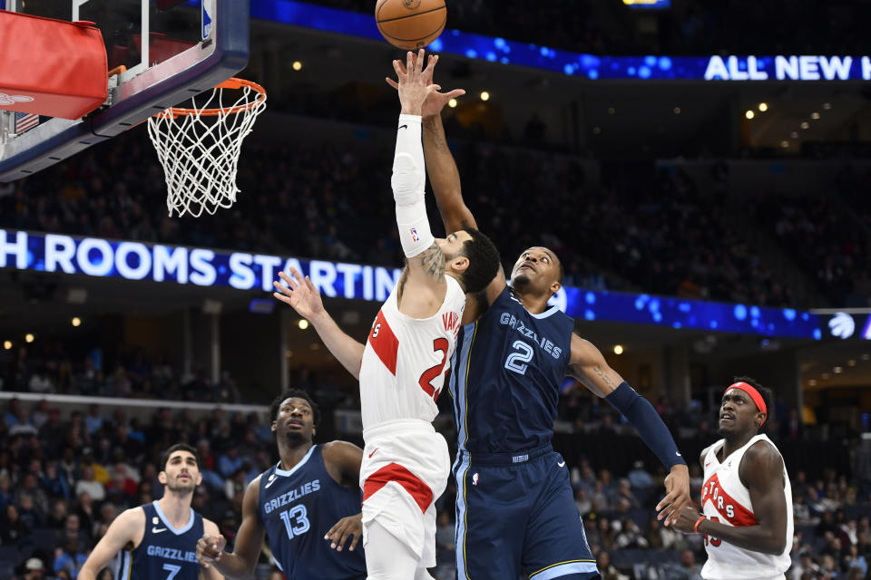 Toronto Raptors guard Fred VanVleet (23) shoots against Memphis Grizzlies forward Xavier Tillman (2) in the first half of an NBA basketball game Sunday, Feb. 5, 2023, in Memphis, Tenn. (AP Photo/Brandon Dill)