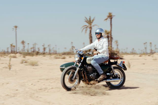 <p>Alex Crétey Systermans</p> Motorcyling in the Palmeraie, a palm grove outside Marrakesh.