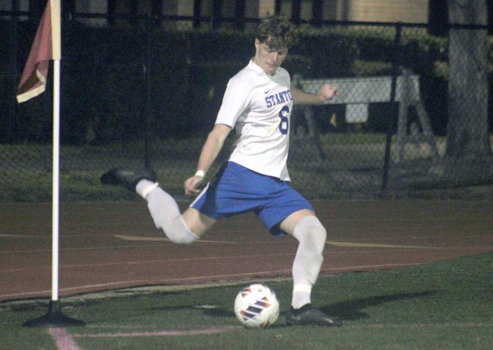 Stanton midfielder James Parks (6) delivers a corner kick against Episcopal. Parks scored both Blue Devil goals in Thursday's 2-0 victory.