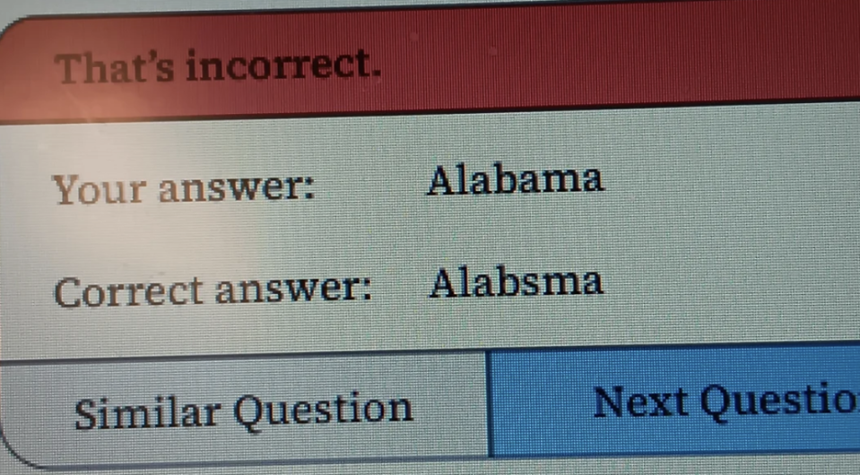 Screen showing a quiz with an incorrect answer "Alabama" and the correct answer "Alabsma" displayed