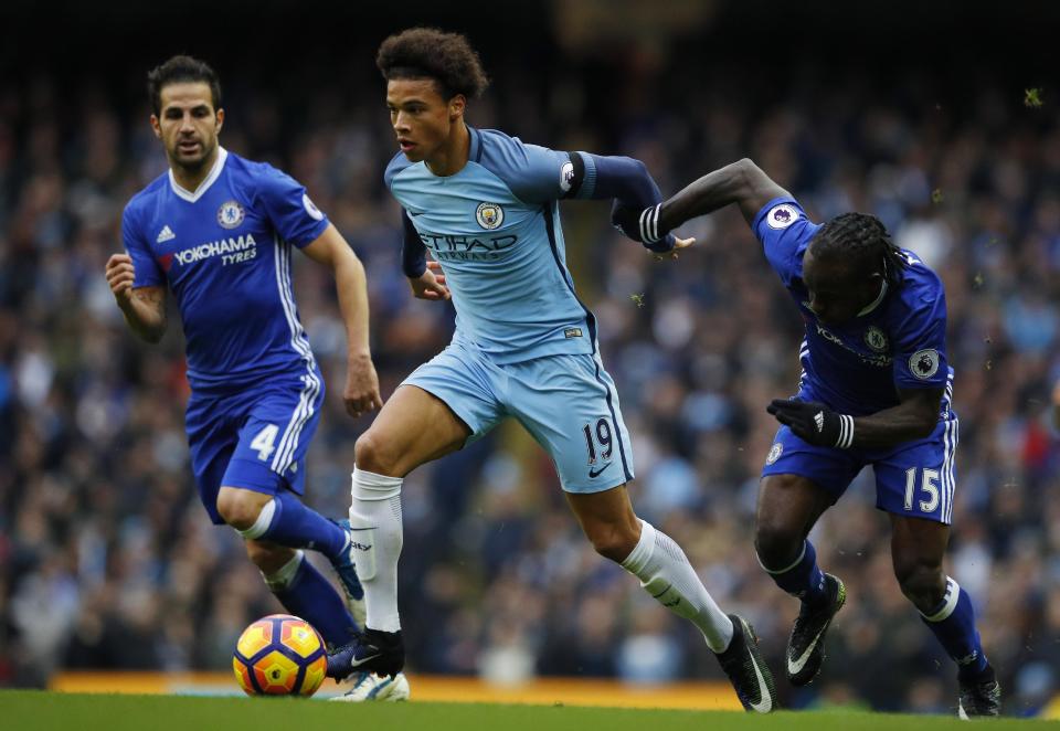 Britain Football Soccer - Manchester City v Chelsea - Premier League - Etihad Stadium - 3/12/16 Manchester City's Leroy Sane in action with Chelsea's Victor Moses and Cesc Fabregas Reuters / Phil Noble Livepic EDITORIAL USE ONLY. No use with unauthorized audio, video, data, fixture lists, club/league logos or "live" services. Online in-match use limited to 45 images, no video emulation. No use in betting, games or single club/league/player publications. Please contact your account representative for further details.