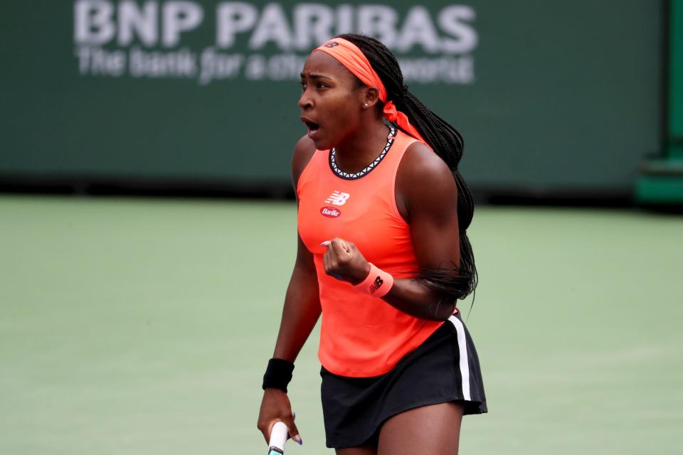 Coco Gauff reacts during the first set against Rebecca Peterson during the BNP Paribas Open in Indian Wells, Calif., on Tuesday, March 14, 2023.  