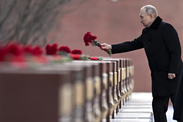 Russian President Vladimir Putin attends a wreath-laying ceremony at the Tomb of the Unknown Soldier, near the Kremlin Wall during the national celebrations of the "Defender of the Fatherland Day" in Moscow, Russia, Thursday, Feb. 23, 2023. The Defenders of the Fatherland Day, celebrated in Russia on Feb. 23, honors the nation's military and is a nationwide holiday. (Pavel Bednyakov, Sputnik, Kremlin Pool Photo via AP)