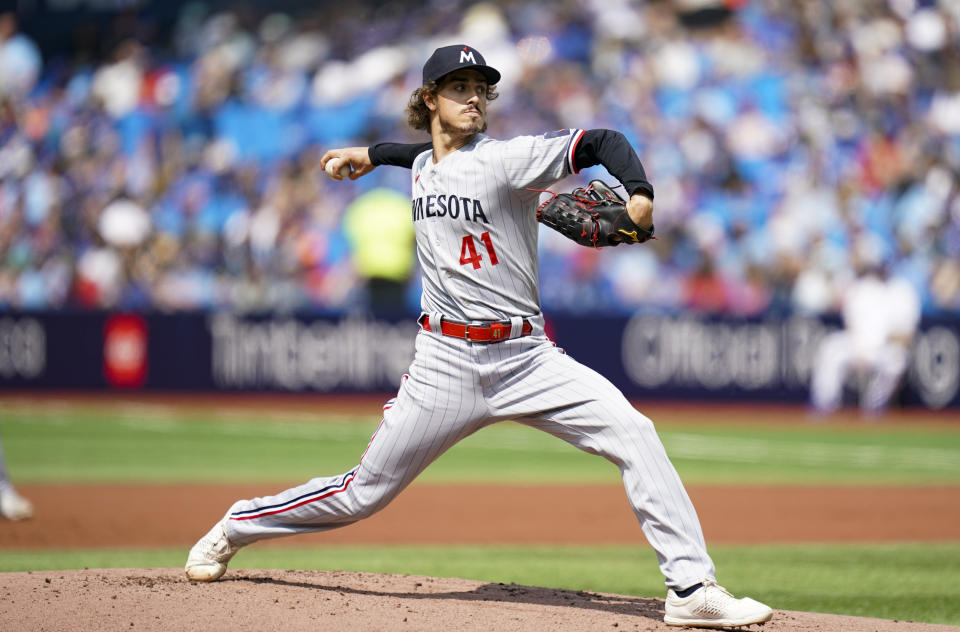 Minnesota Twins starting pitcher Joe Ryan (41) throws against the Toronto Blue Jays during the first inning of a baseball game in Toronto, Saturday, June 10, 2023. (Arlyn McAdorey/The Canadian Press via AP)