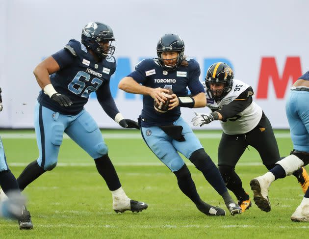 Toronto Argonauts quarterback McLeod Bethel-Thompson scrambles in traffic during the CFL's Eastern Final, which was marred by a postgame incident. (Photo: Richard Lautens via Getty Images)