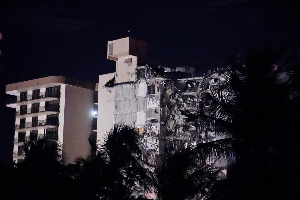 A partial collapsed building is seen early Thursday, June 24, 2021, in Surfside area of Miami, Fla.