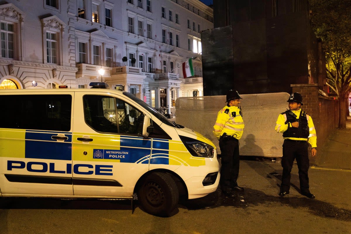 Police stand guard outside the Iranian Embassy in central London (Luke O’Reilly/PA) (PA Wire)