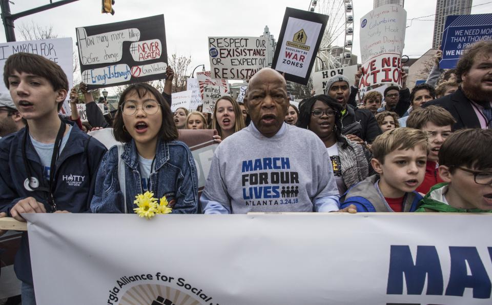 U.S. Rep. John Lewis leads a march of thousands through the streets of Atlanta on Saturday.