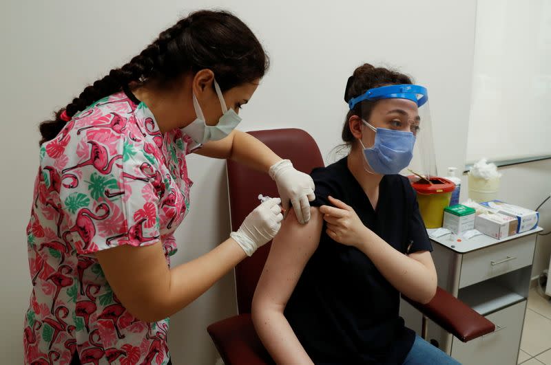 Turkey begins mass COVID-19 vaccinations with health workers, in Istanbul