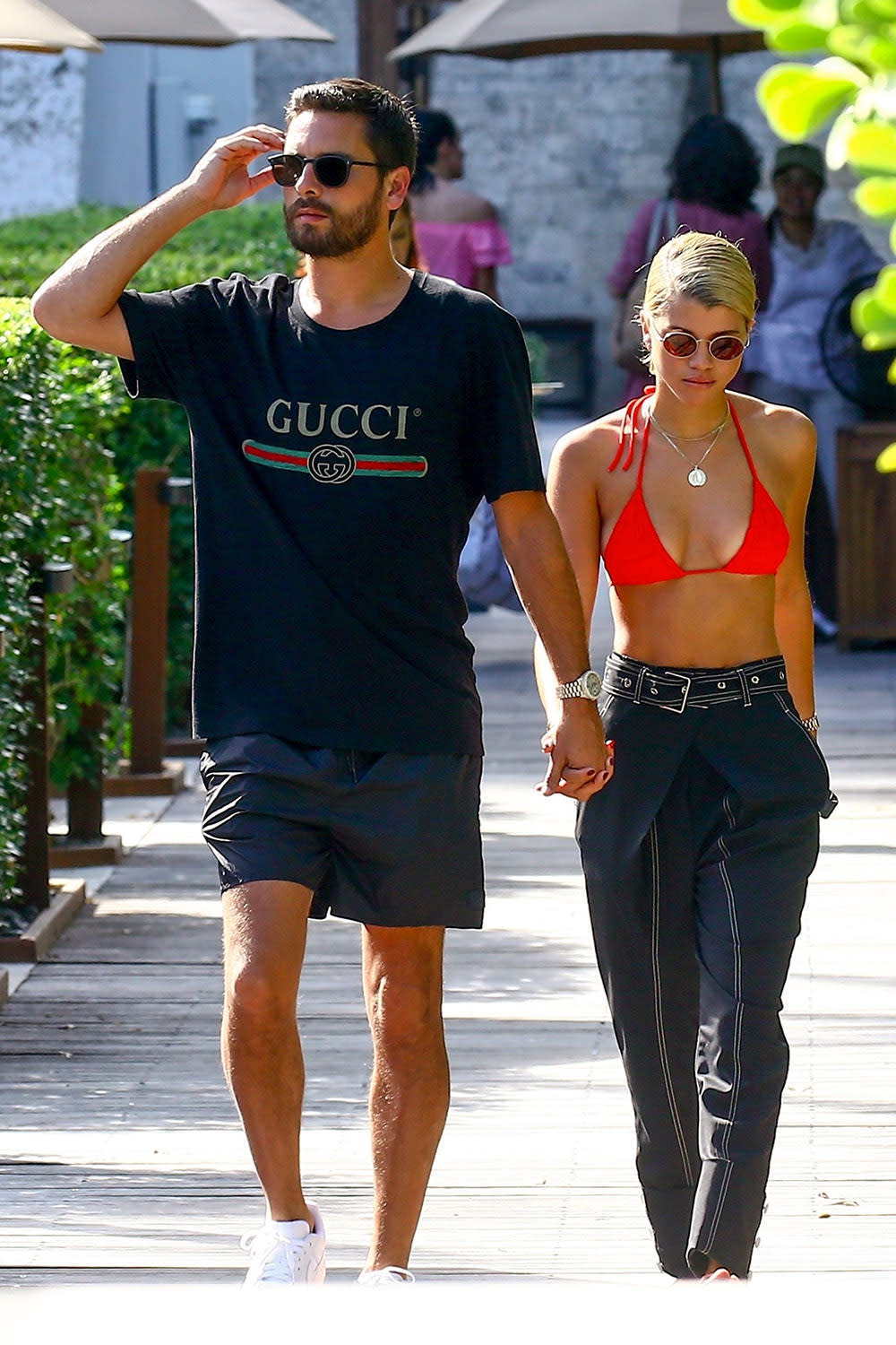 Scott Disick and Sofia Richie hold hands in Miami. (Photo: BACKGRID)