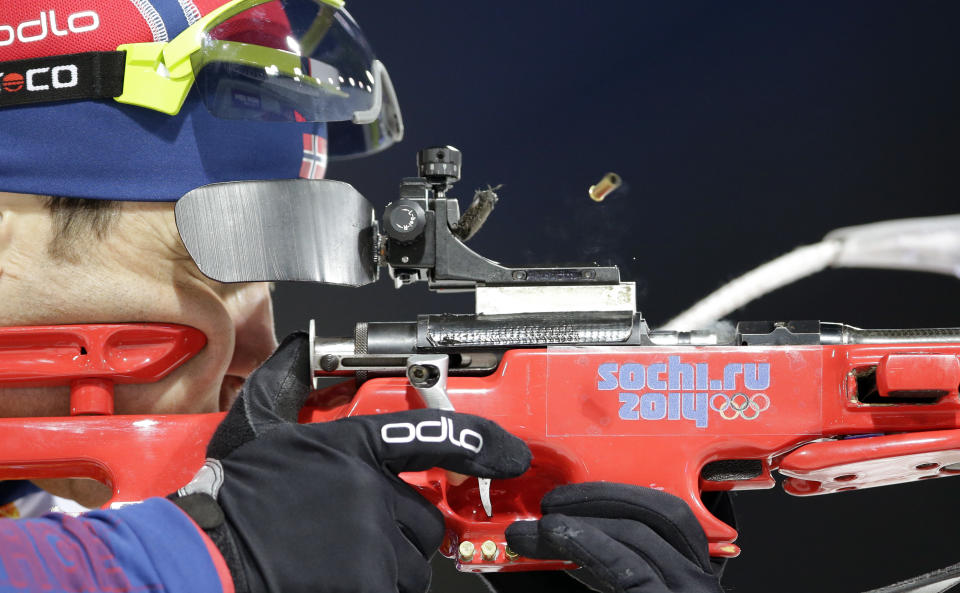 Norway's Ole Einar Bjoerndalen shoots during the men's biathlon 4x7.5K relay at the 2014 Winter Olympics, Saturday, Feb. 22, 2014, in Krasnaya Polyana, Russia. (AP Photo/Lee Jin-man)