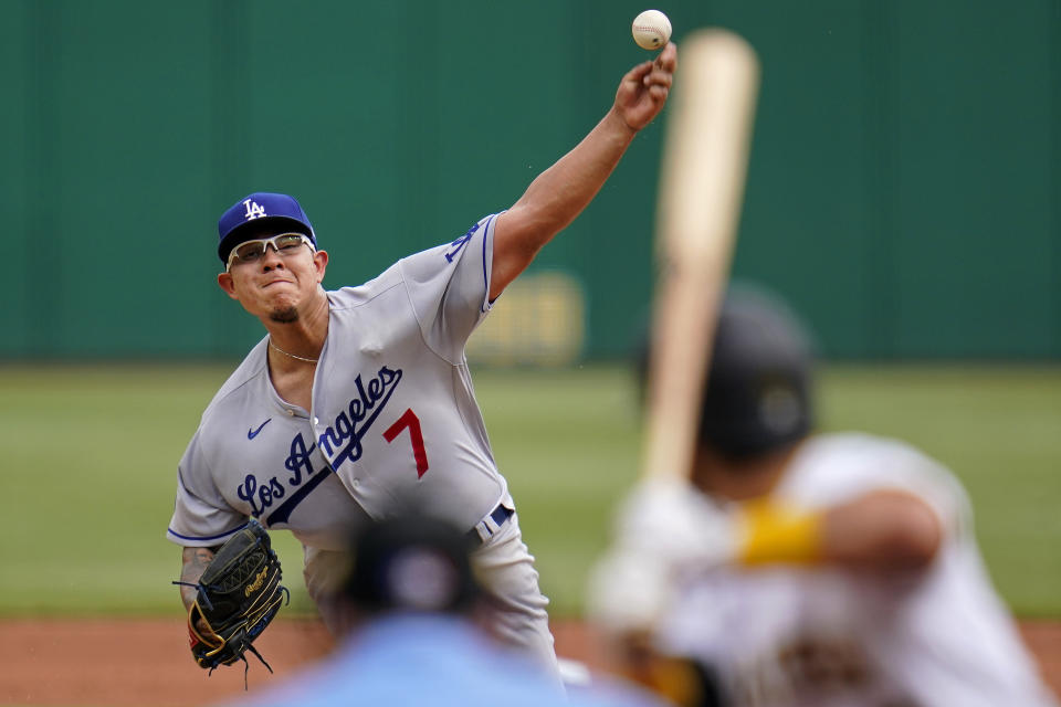 Los Angeles Dodgers starting pitcher Julio Urias (7) delivers during the first inning of a baseball game against the Pittsburgh Pirates in Pittsburgh, Thursday, June 10, 2021. (AP Photo/Gene J. Puskar)